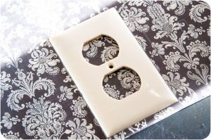 Scrapping switch plate cover